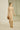 Figurbetontes, gestricktes französisches Luxuskleid mit asymmetrischem Ausschnitt